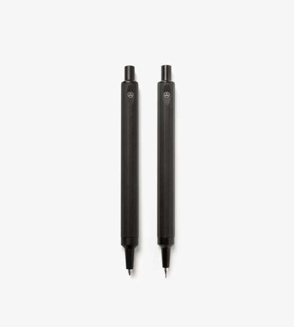 12-sided, machined black pencil and pen.