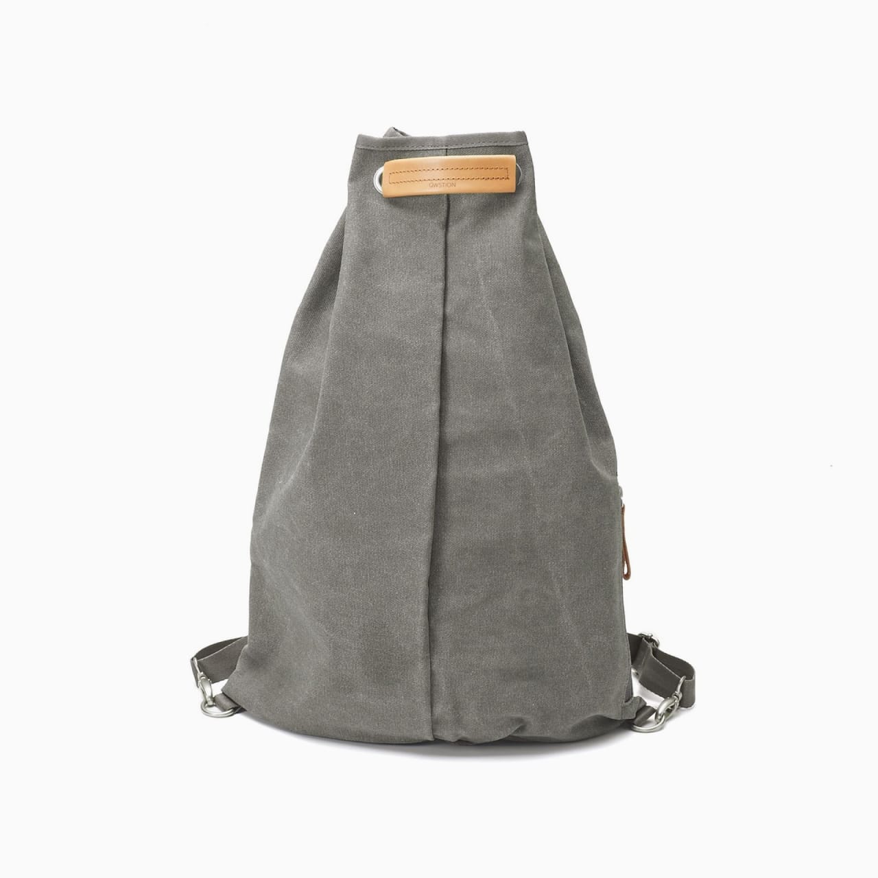 Washed grey canvas bag with crumbled body, matching straps, and natural leather drawstring handle.