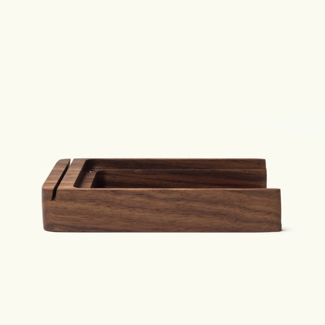 Side of walnut card tray with card groove and recessed card area.