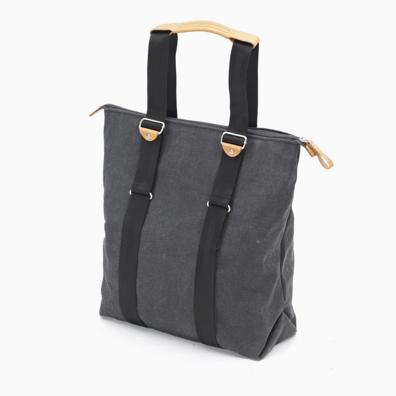 Angled front view with bag zipped and handles upright.